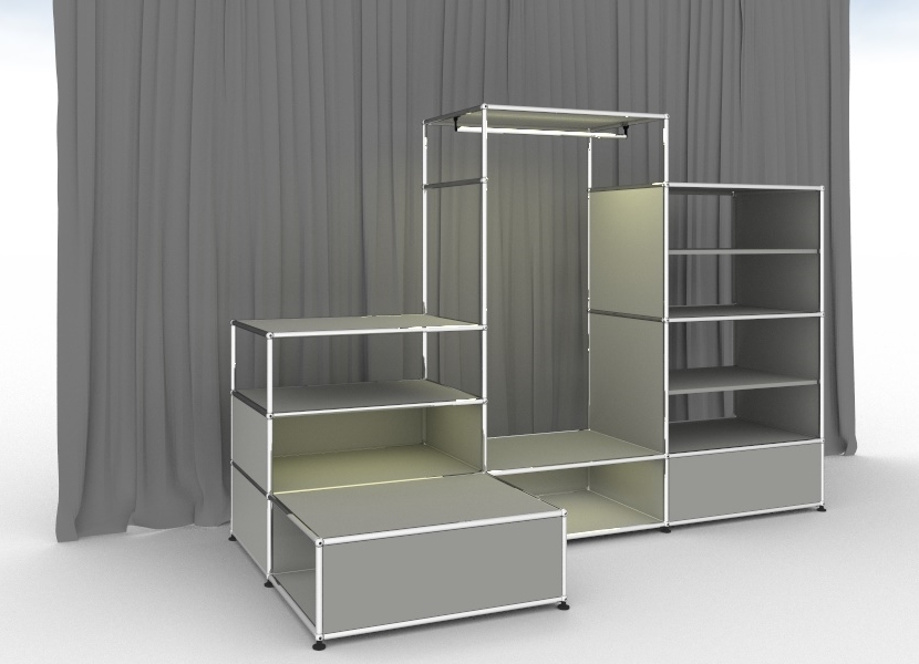 E Garderobe lichtgrau von USM Haller mit Beleuchtung, Regalen und Kleiderstange.
