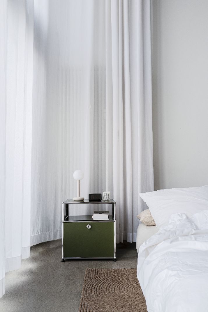 USM Haller M55 bedside table with hinged door pure white