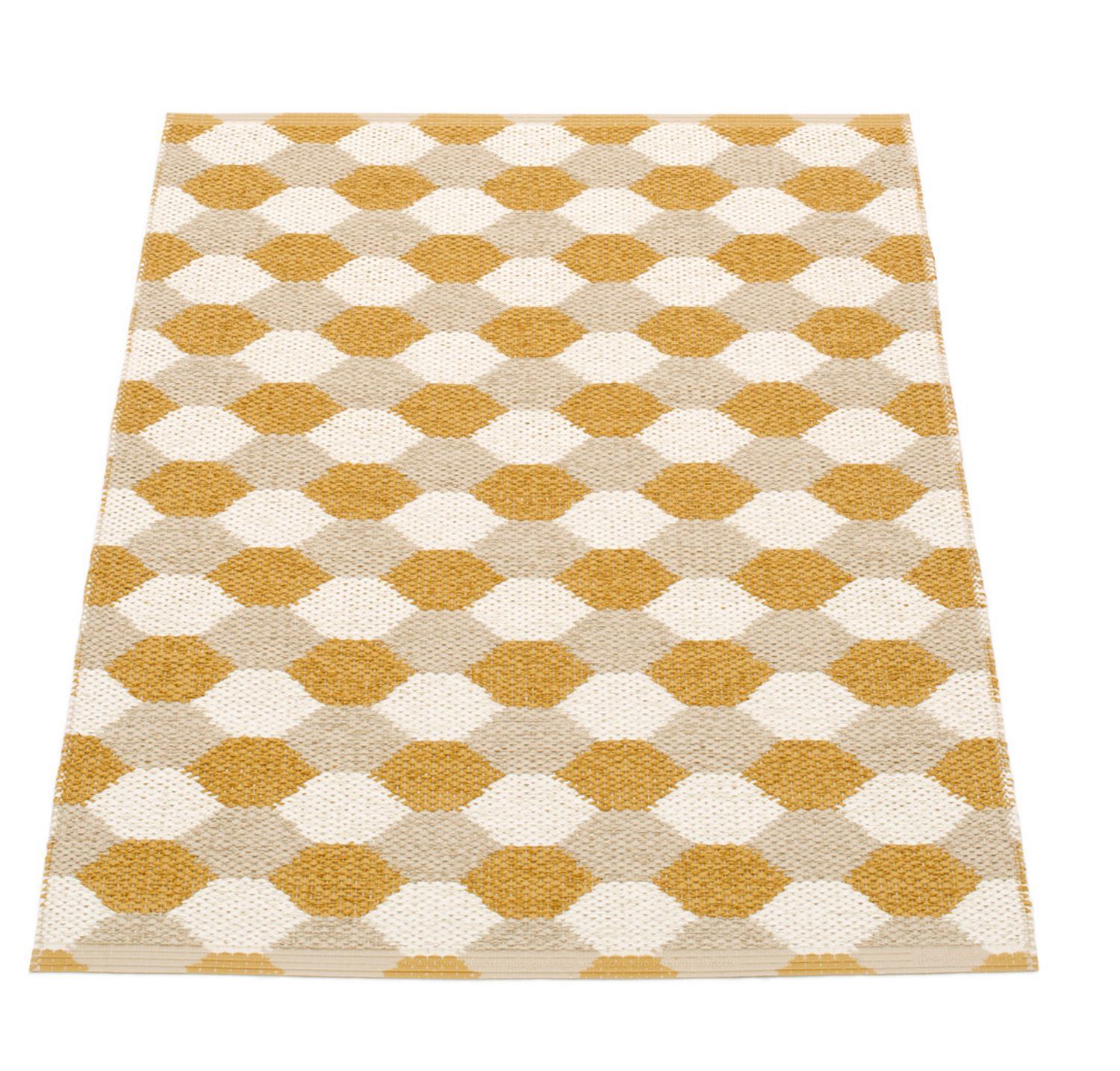 Dana plastic carpet 70x100 ocher pappelina