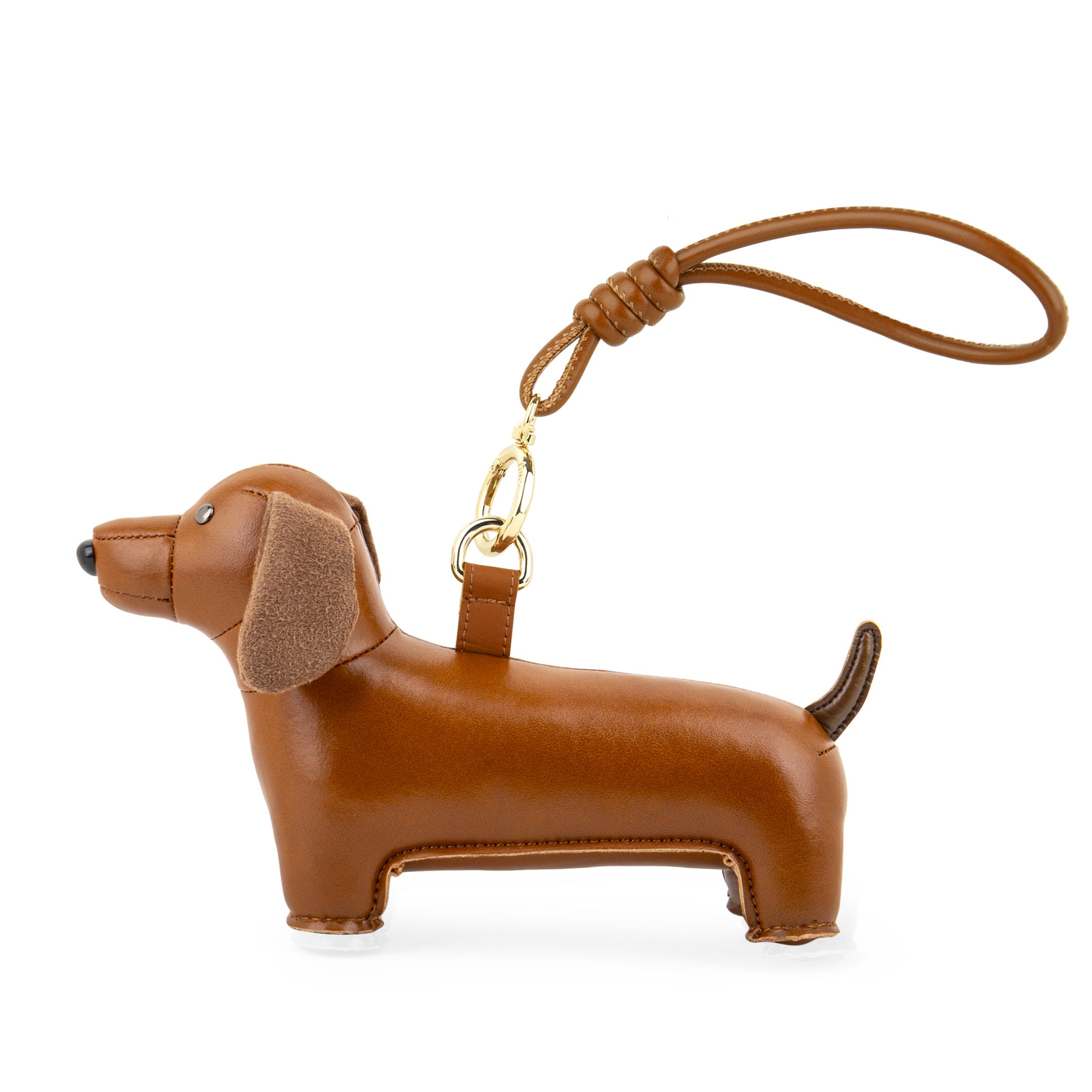 Taschenanhänger Dackel von Züny aus braunem Kunstleder mit Schlaufe und goldenem Ring.