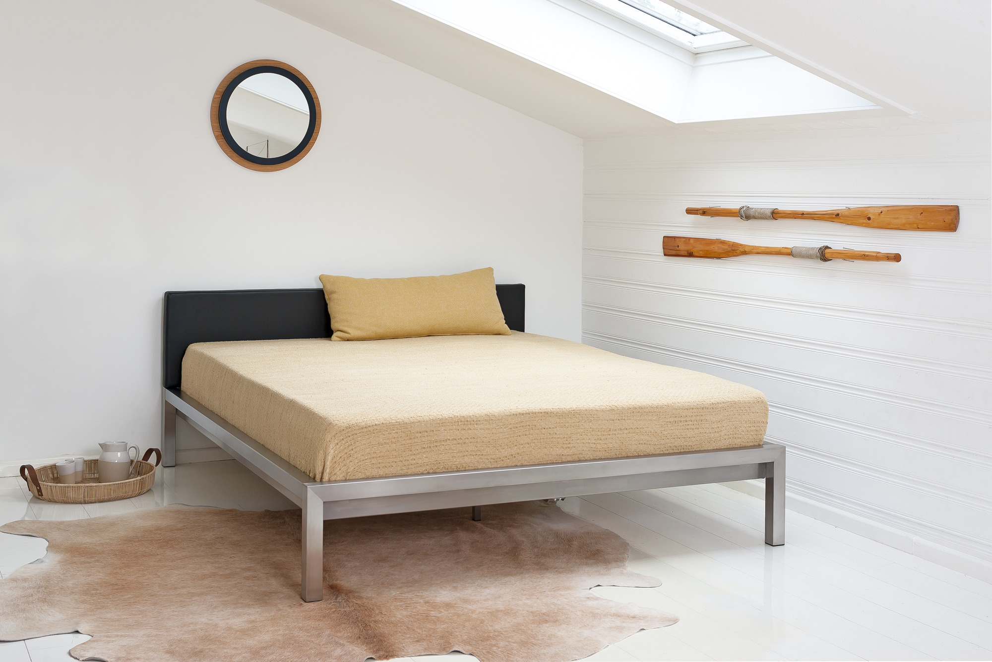 Pure stainless steel bed with upholstered headboard imitation leather black Hans Hansen