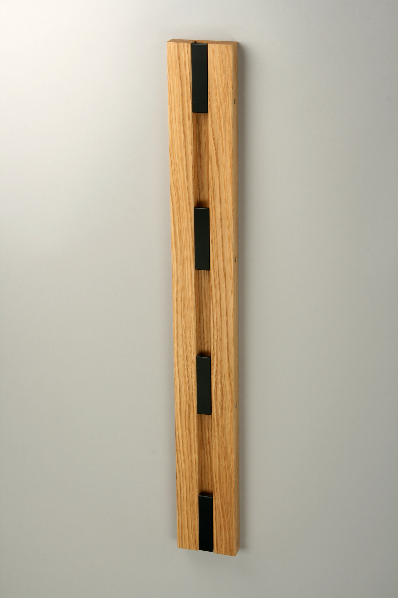 Knax Coat rack wall mounted vertical 4 hooks Loca oiled oak-black