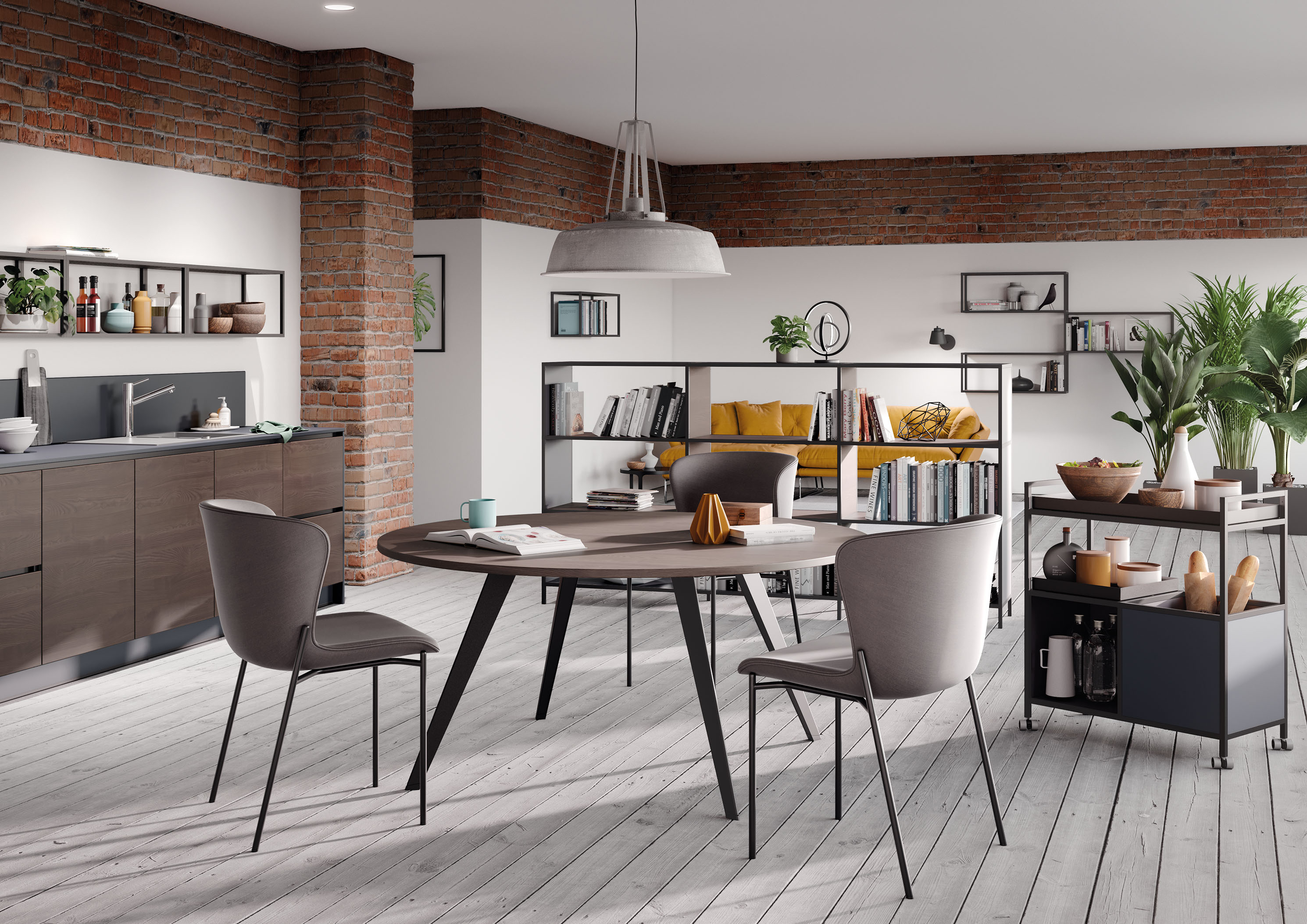 Moderner Essbereich mit rundem Holztisch, grauen Stühlen, Küchenzeile und Wohnbereich im Loft-Stil.