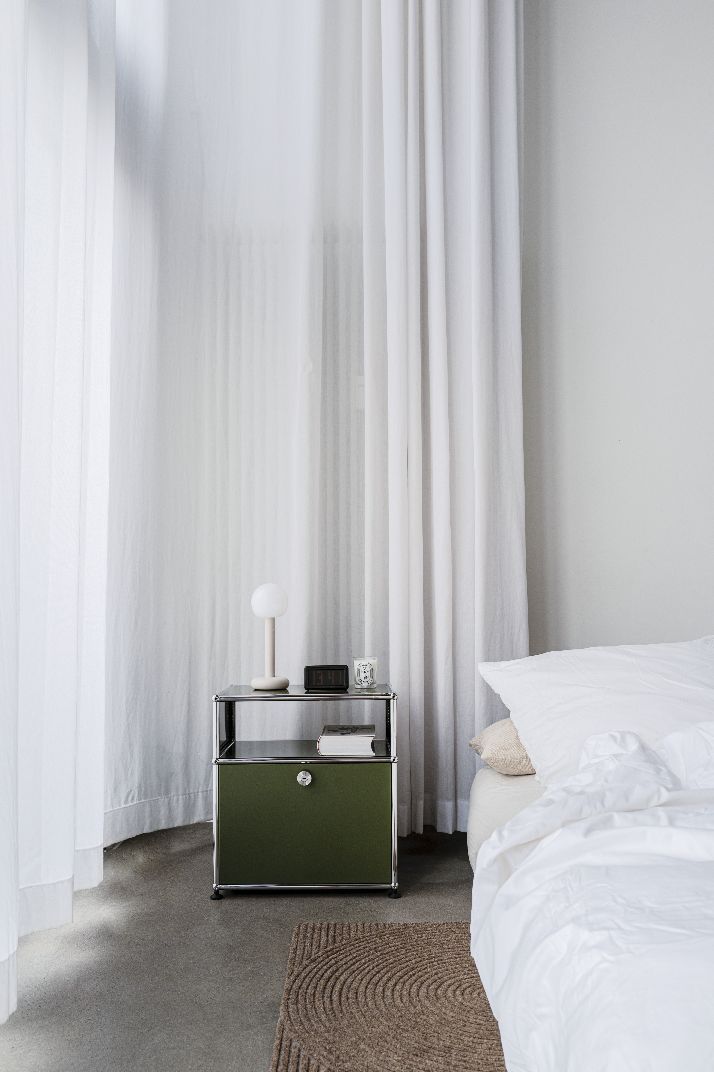 USM Haller M55 bedside table with hinged door pure white