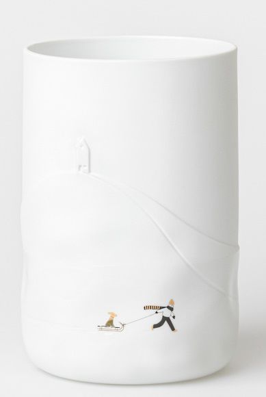 Snow day vase dog sled wheels