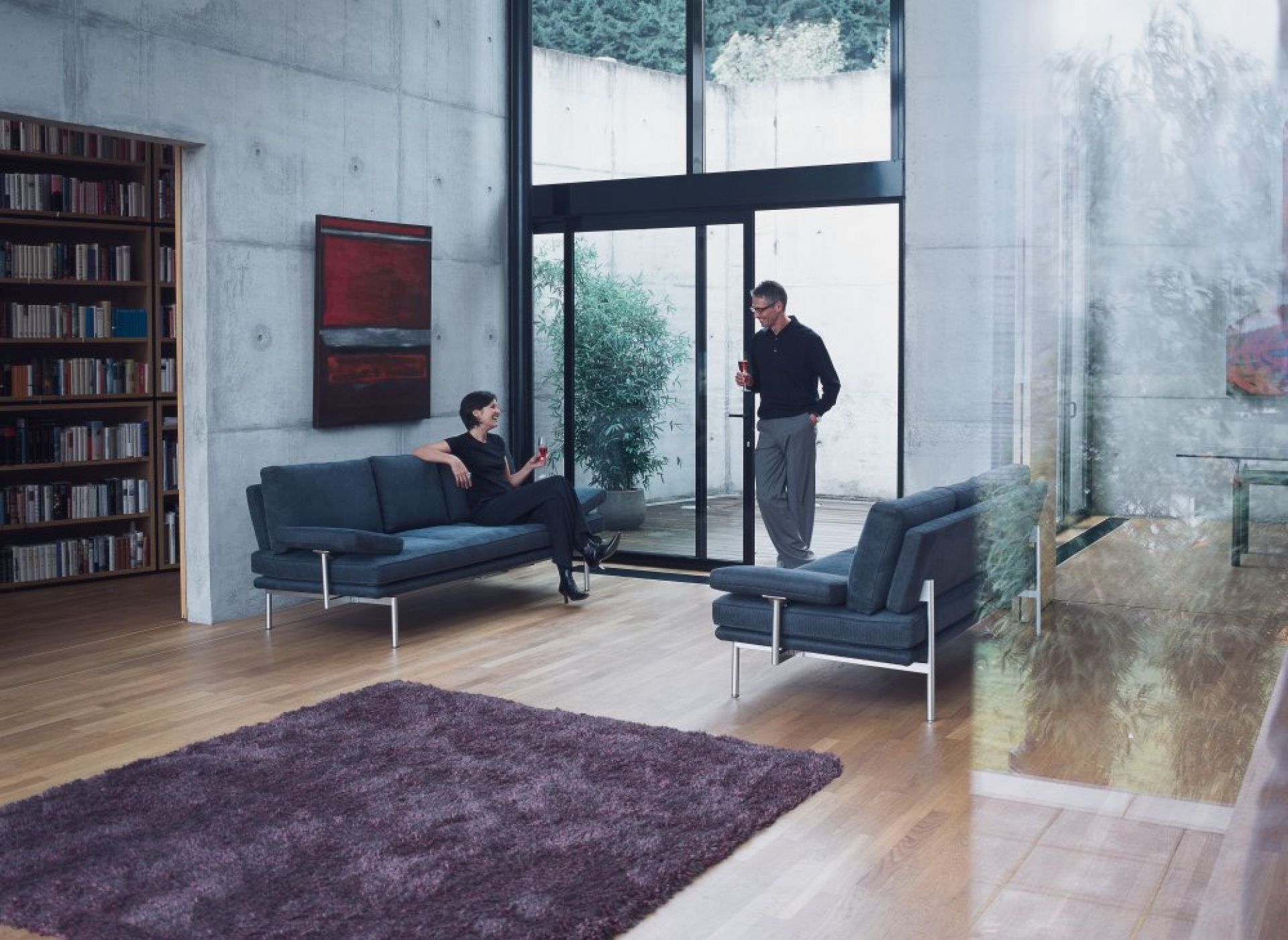 LIVING PLATFORM Sofa with two functional armrests Walter Knoll
