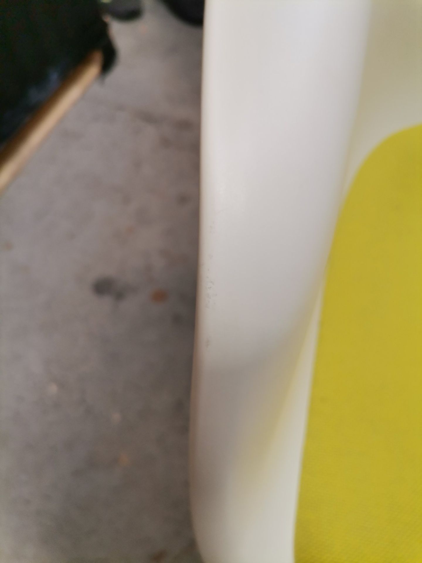 Eames Plastic Arm Chair DAR chair with seat cushion green / yellow Vitra IMPERFECT ITEMS