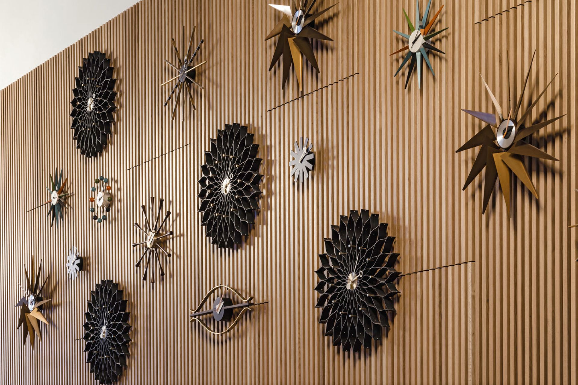Sunburst Clock Wall Clock - black / brass Vitra