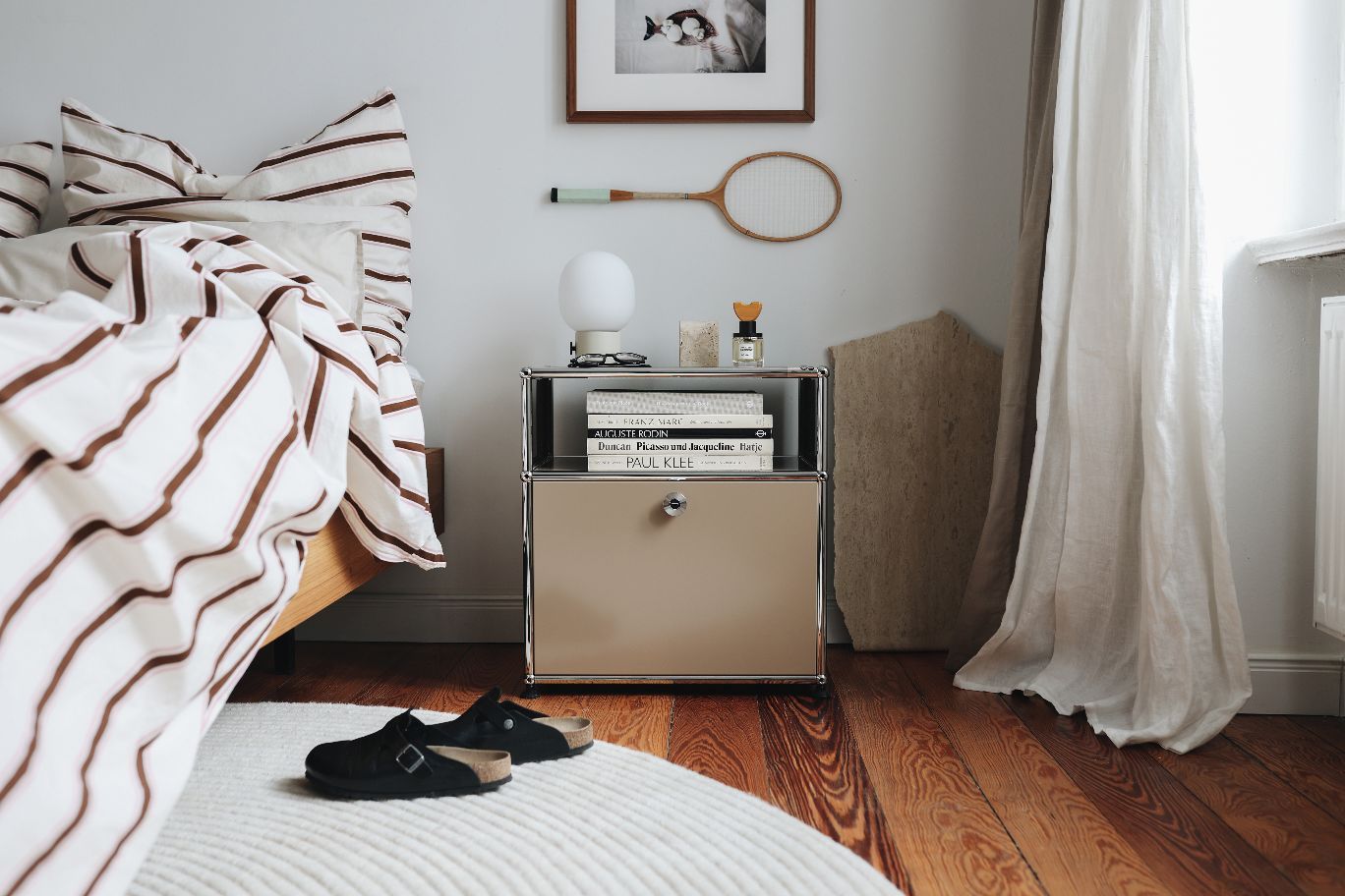USM Haller M55 bedside table with hinged door pure white