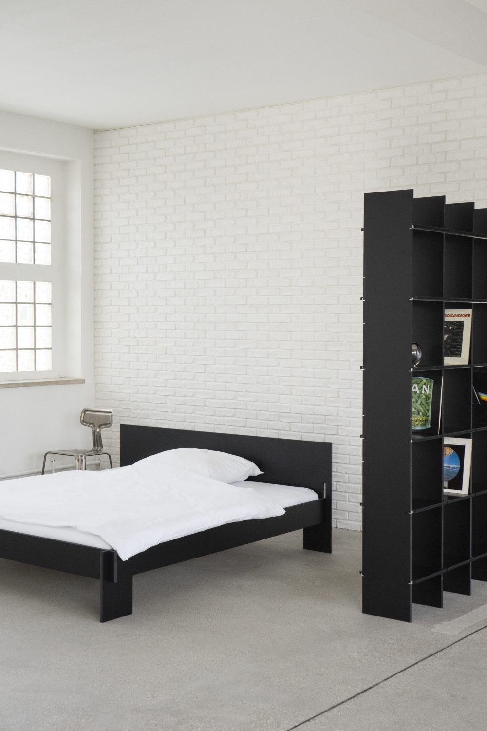  Seven sleeper bed with headboard Nils Holger Moormann