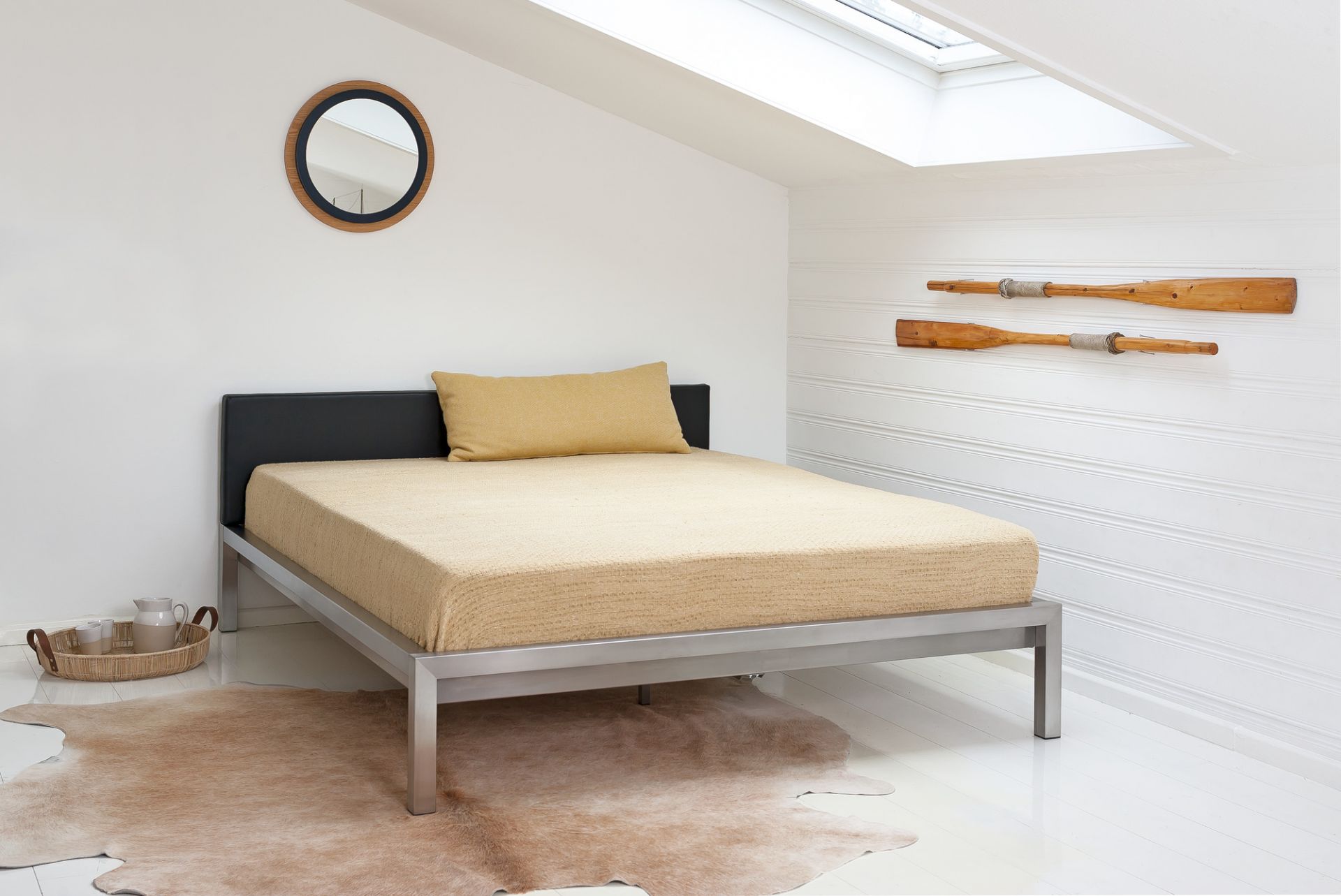 Pure stainless steel bed with upholstered headboard imitation leather black Hans Hansen