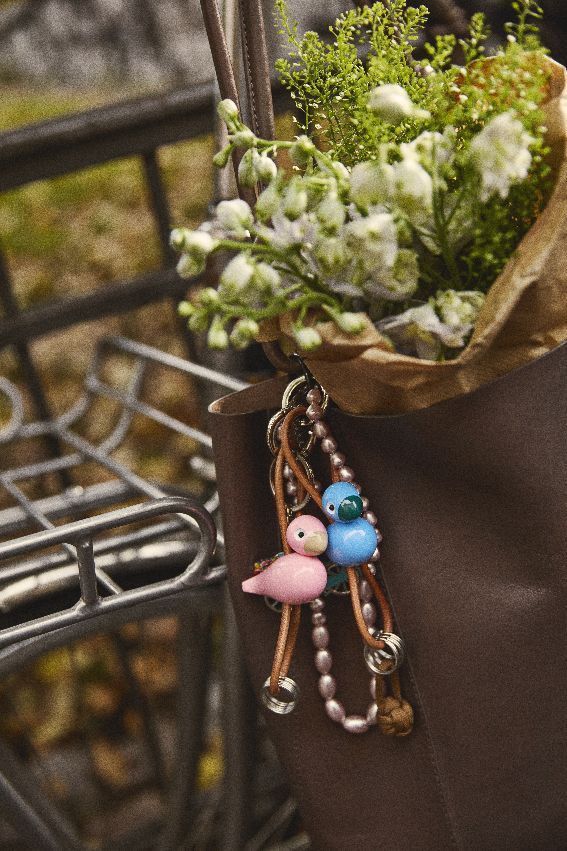 Bird pink key ring silver coloured metal with natural leather Kay Bojesen