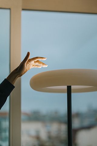 Oto floor lamp round base Belux 