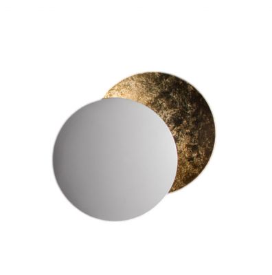 Lederam W Wandleuchte von Catellani & Smith: Runde Wandlampe mit goldener Rückseite.