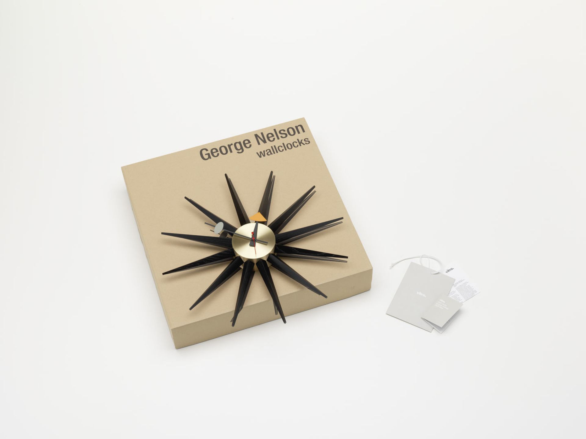 Sunburst Clock Wall Clock - black / brass Vitra