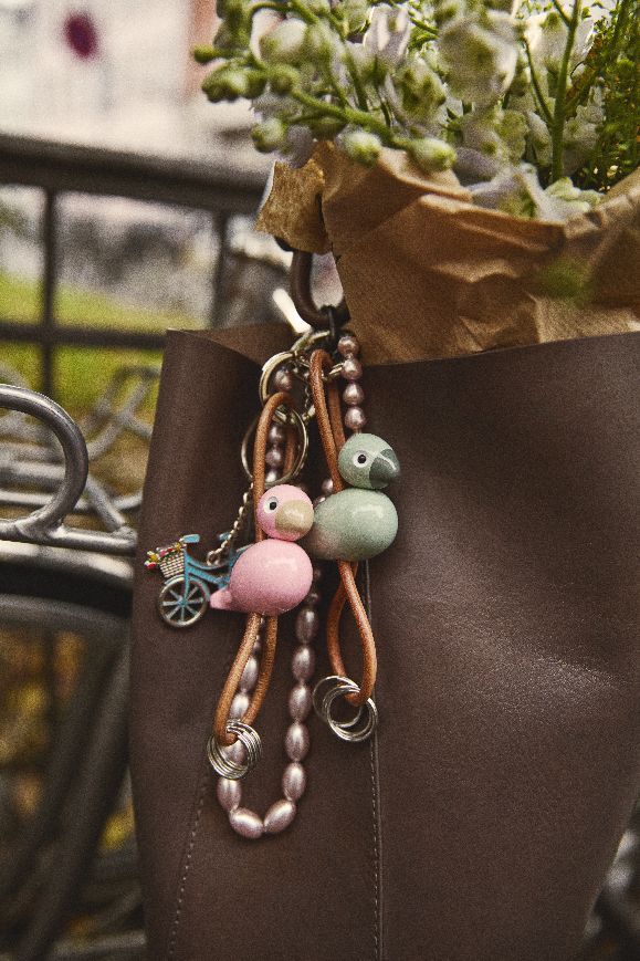 Bird pink key ring silver coloured metal with natural leather Kay Bojesen